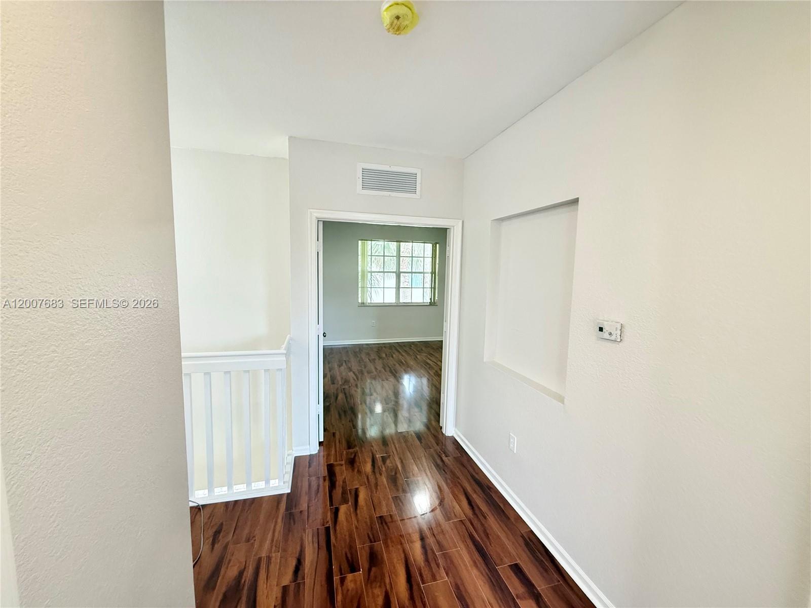 2674 Southwest 84th Terrace, Unit 102 Miramar, FL 33025 - Photo 33 of 57 a view of entryway with wooden floor