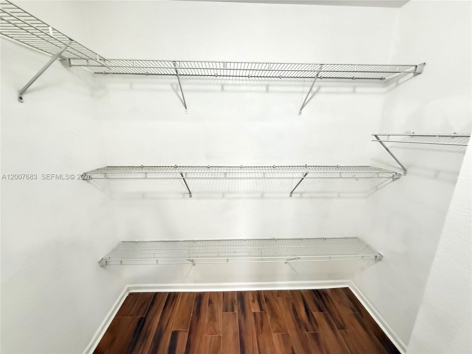 2674 Southwest 84th Terrace, Unit 102 Miramar, FL 33025 - Photo 39 of 57 a view of a room with racks on the wall
