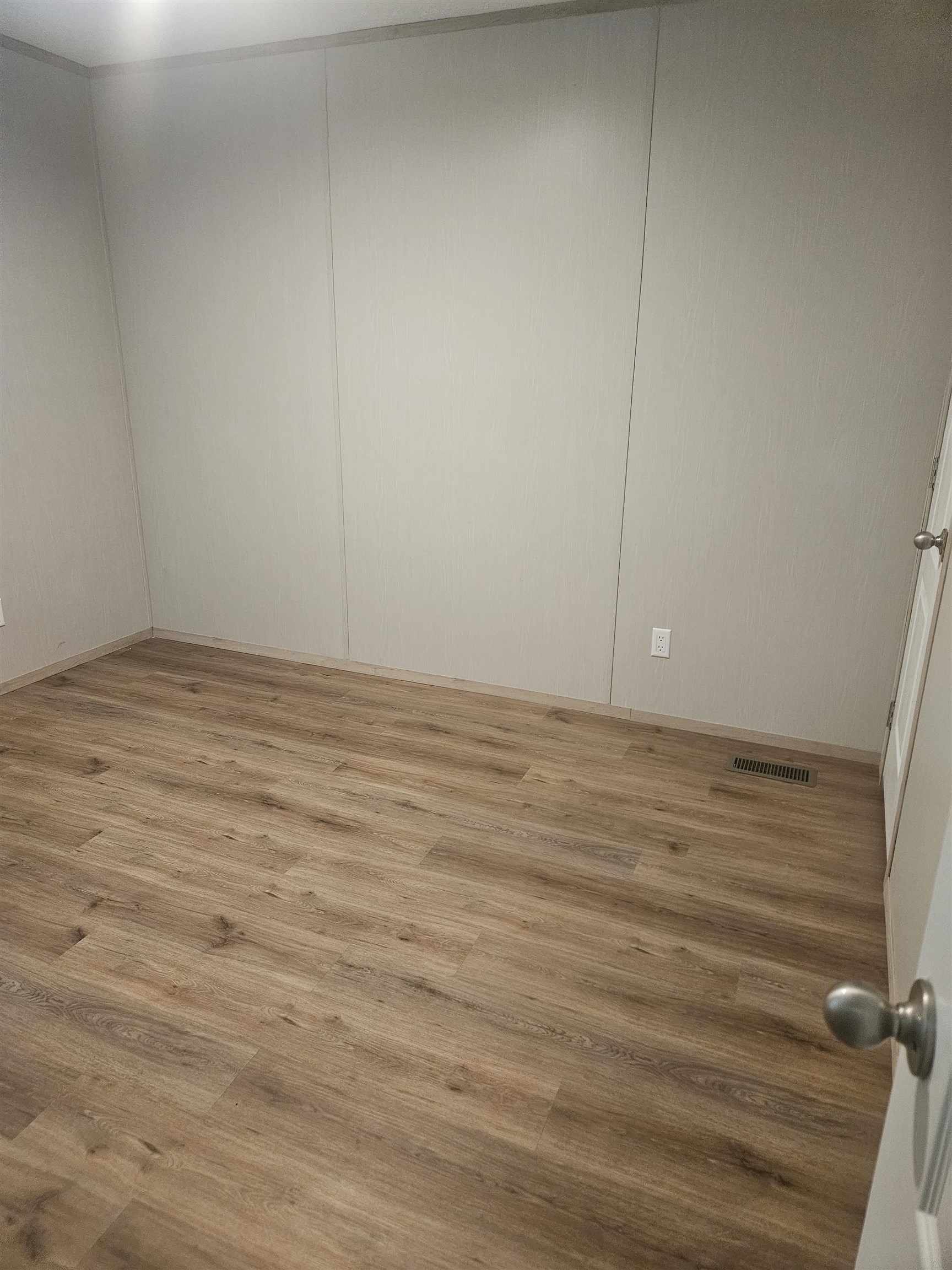 75 Pittman Road, Unit ROAD Somerville, TN 38068 - Photo 20 of 26 Light wood-finish flooring with a neutral wall color