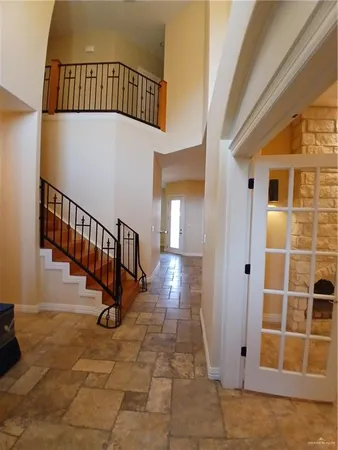 a view of a balcony with stairs