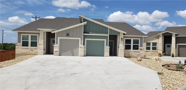 a view of a house with a patio