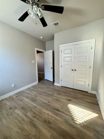 a view of a room with a bench and dryer