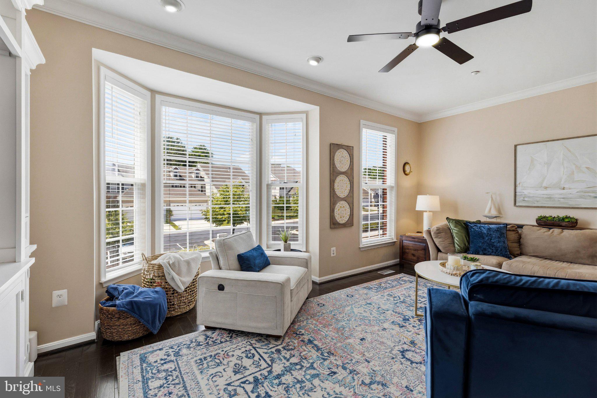 2668 Merlin Court Odenton, MD 21113 - Photo 14 of 42 a living room with furniture and a large window