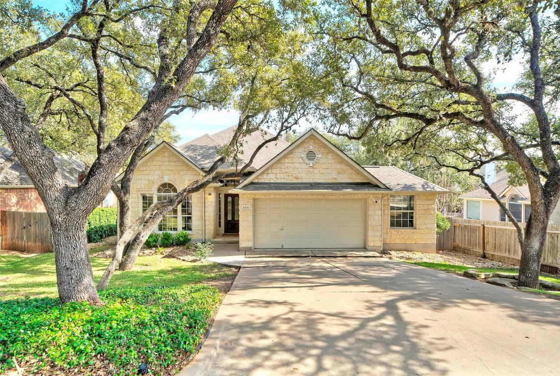 6535 Clairmont Drive Austin, TX 78749 - Photo 1 of 1 a front view of a house with a yard