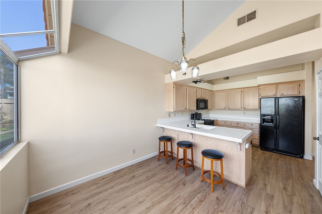 4930 Frazee Road Oceanside, CA 92057 - Photo 12 of 39 kitchen and breakfast bar