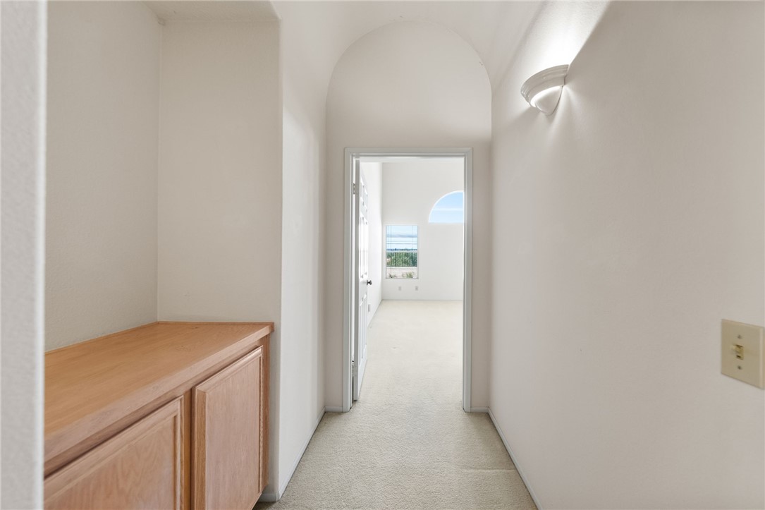 4930 Frazee Road Oceanside, CA 92057 - Photo 20 of 39 hallway to primary bedroom