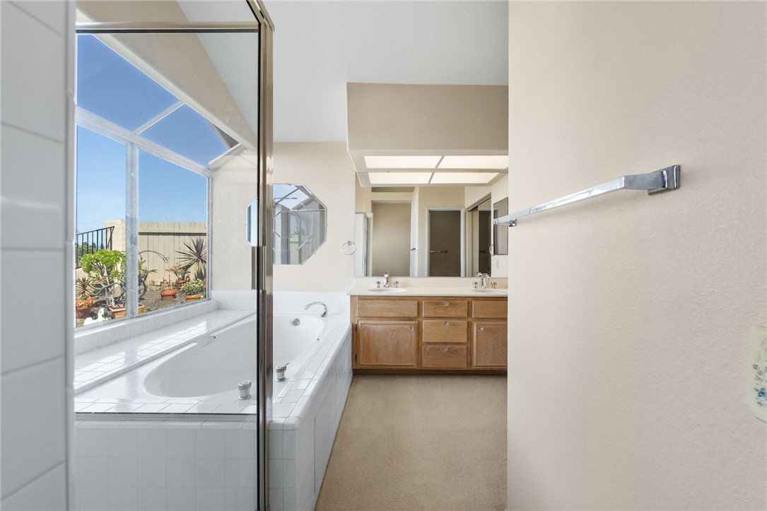 4930 Frazee Road Oceanside, CA 92057 - Photo 23 of 39 primary bathroom tub and shower seperate