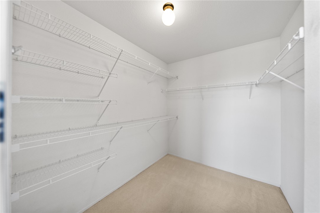 4930 Frazee Road Oceanside, CA 92057 - Photo 26 of 39 walk in closet primary bedroom