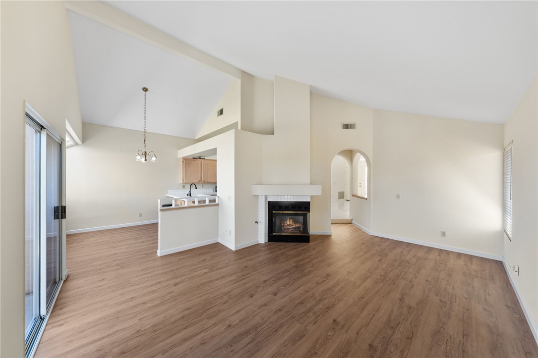 4930 Frazee Road Oceanside, CA 92057 - Photo 10 of 39 family room open to eat in area of kitchen