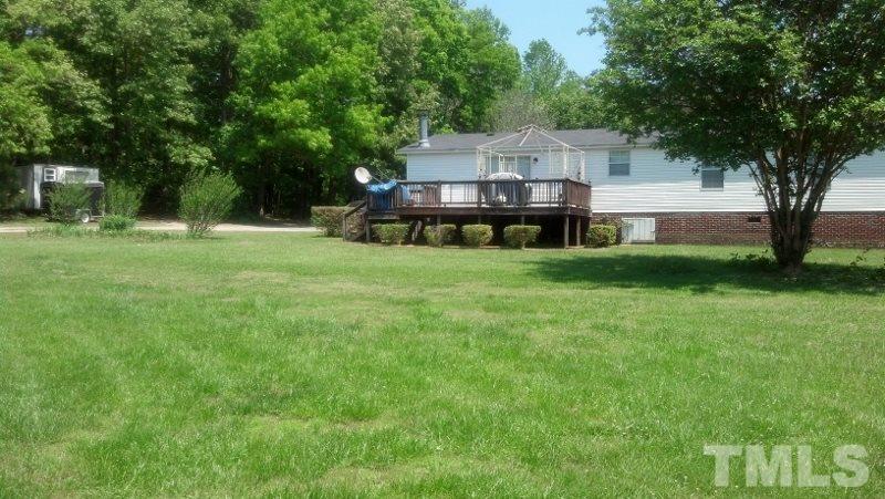 1135 B Lawrence Road Creedmoor, NC 27522 - Photo 9 of 13 a house view with a garden space