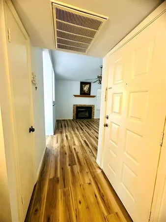 a front view of a house with a wooden floor