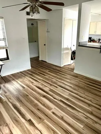 a view of a bedroom from the hallway