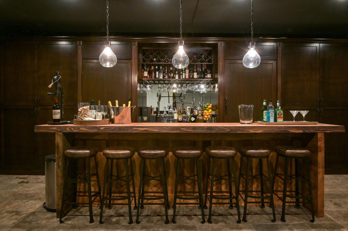 224 Warren Road San Mateo, CA 94402 - Photo 27 of 36 a bathroom with a sink and a large mirror