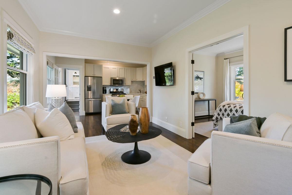 224 Warren Road San Mateo, CA 94402 - Photo 28 of 36 a living room with furniture and a table