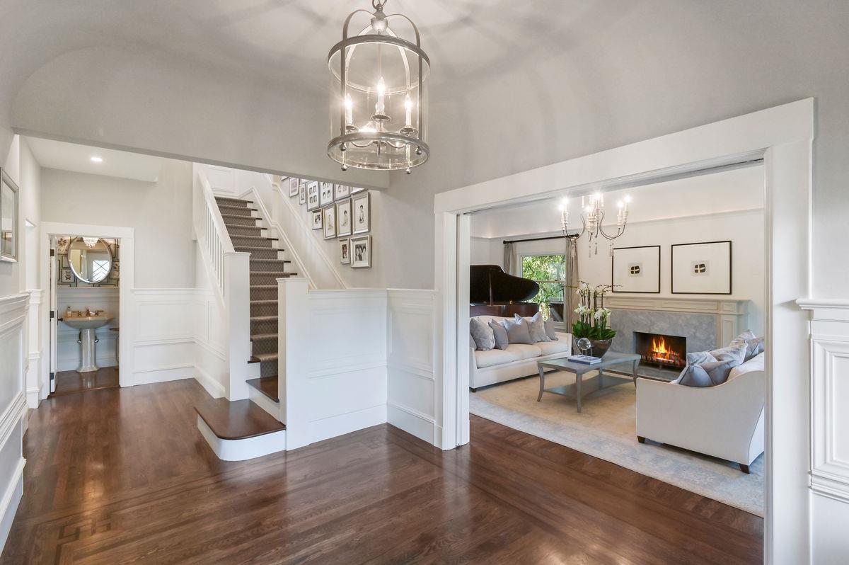 224 Warren Road San Mateo, CA 94402 - Photo 3 of 36 a living room with furniture and a chandelier