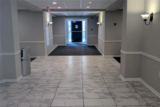 a bathroom with a sink and a shower