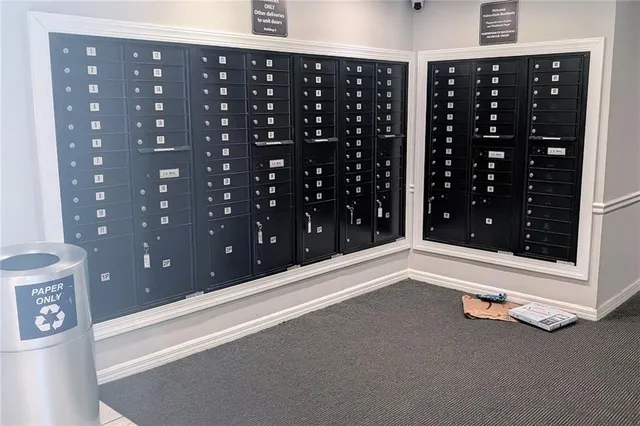 a view of a swimming pool with outdoor seating