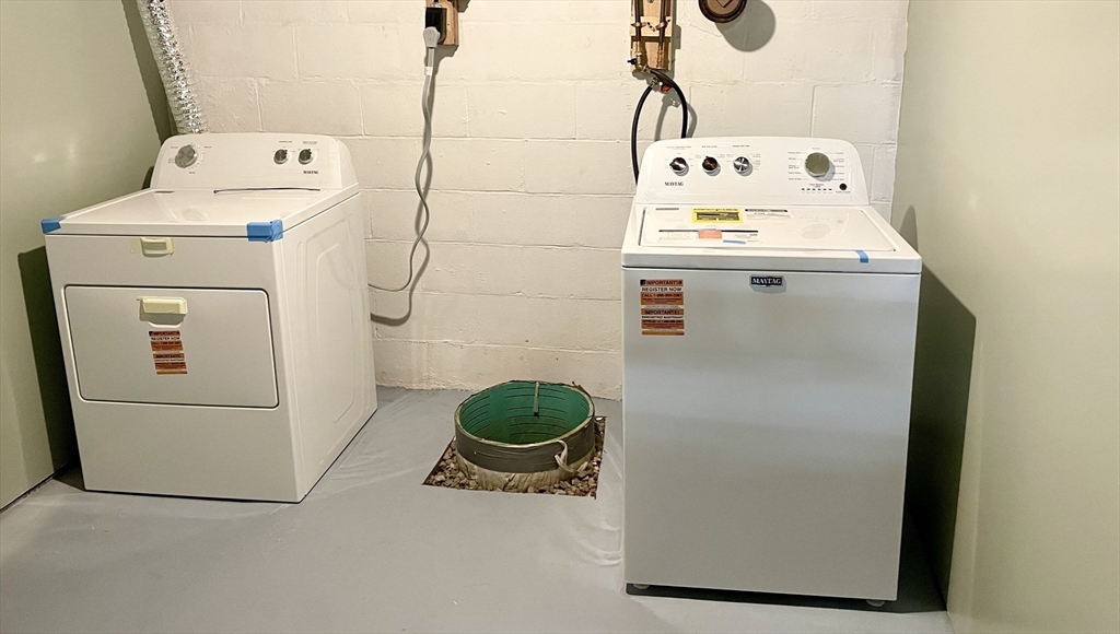 371 Wilbraham Street, Unit 1 Palmer, MA 01069 - Photo 12 of 21 a utility room with dryer and washer
