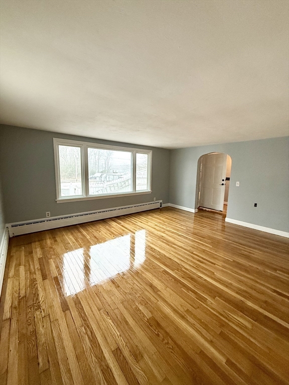 371 Wilbraham Street, Unit 1 Palmer, MA 01069 - Photo 4 of 21 a view of a room with wooden floor