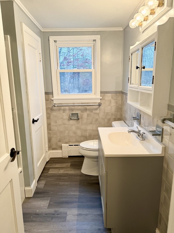 371 Wilbraham Street, Unit 1 Palmer, MA 01069 - Photo 6 of 21 a bathroom with a sink toilet and shower