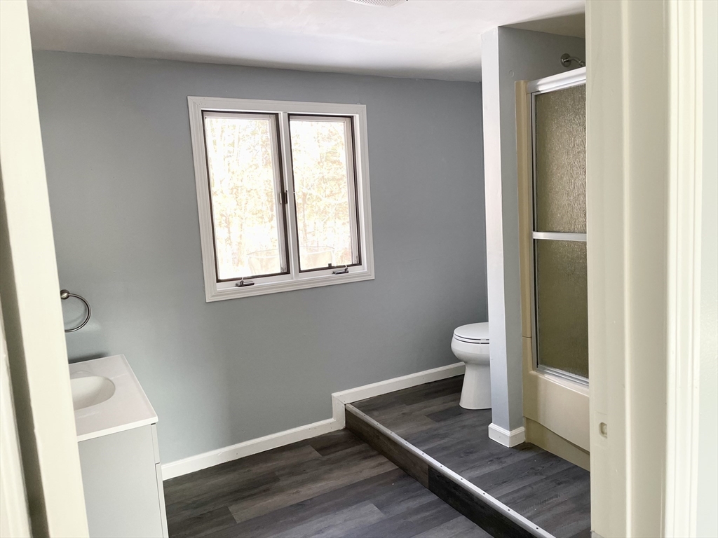 371 Wilbraham Street, Unit 1 Palmer, MA 01069 - Photo 7 of 21 a view of wooden floor in a room