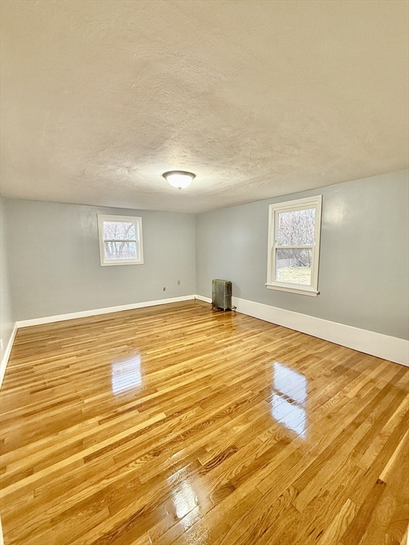 371 Wilbraham Street, Unit 1 Palmer, MA 01069 - Photo 8 of 21 a view of empty room and window