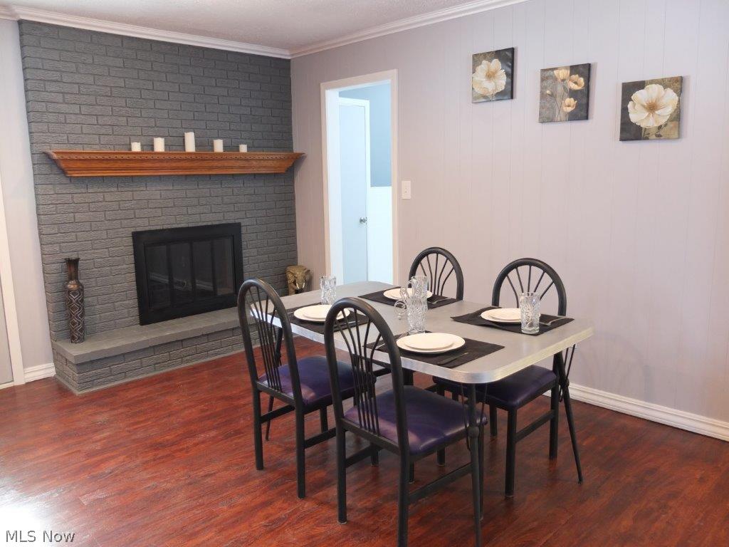 3262 Boyne Road Barberton, OH 44203 - Photo 3 of 20 Dining room with fireplace.