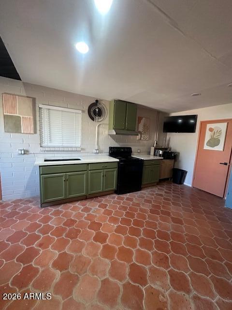 1705 6th Green Street Douglas, AZ 85607 - Photo 14 of 17 a kitchen with a cabinets a sink and a stove top oven