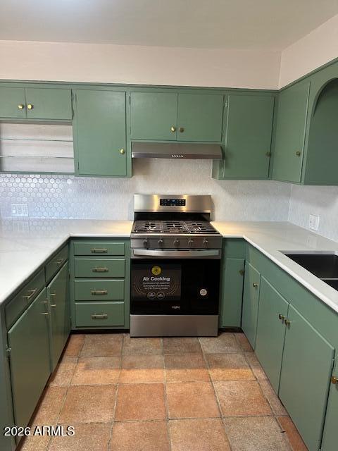 1705 6th Green Street Douglas, AZ 85607 - Photo 3 of 17 a kitchen with a refrigerator and a sink