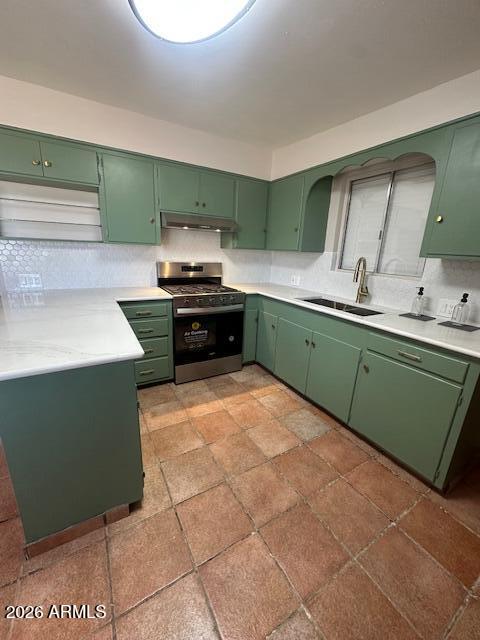1705 6th Green Street Douglas, AZ 85607 - Photo 5 of 17 a kitchen with a sink and a stove top oven