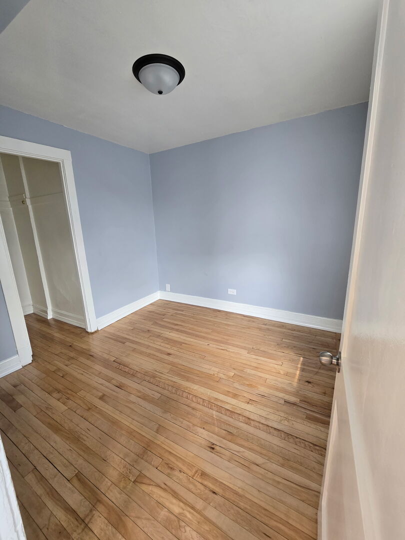10758 South Indiana Avenue, Unit 2 Chicago, IL 60628 - Photo 8 of 8 a view of room