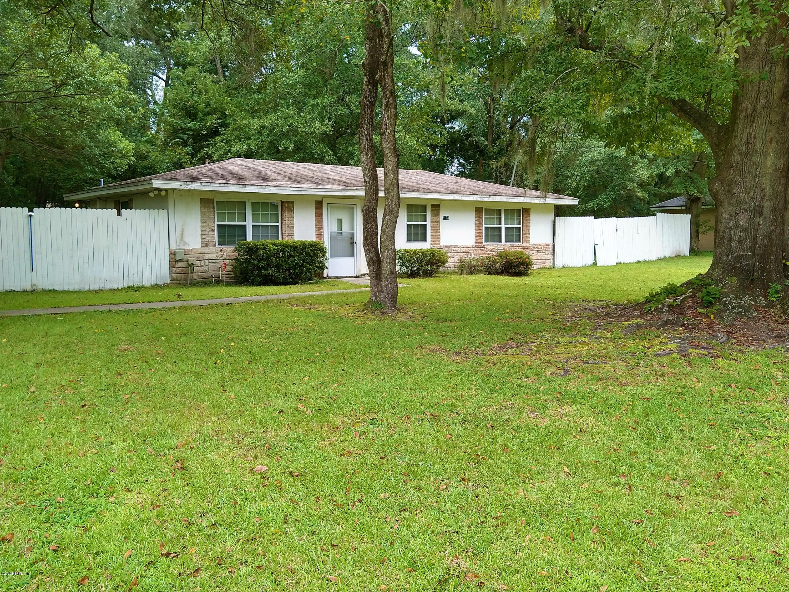 2103 Benedict Road Jacksonville, FL 32209 - Photo 2 of 35 a front view of a house with a yard