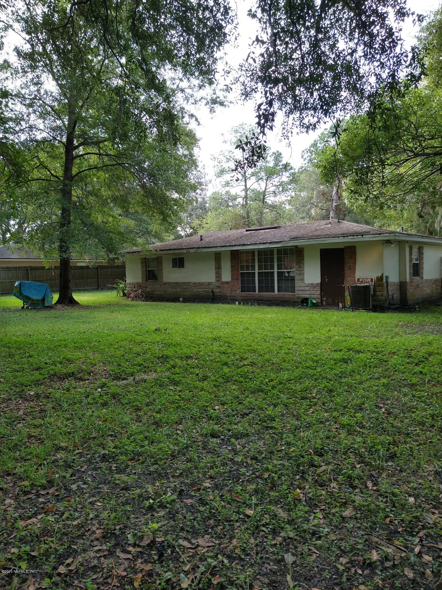 2103 Benedict Road Jacksonville, FL 32209 - Photo 24 of 35 a view of a house with a yard and sitting area