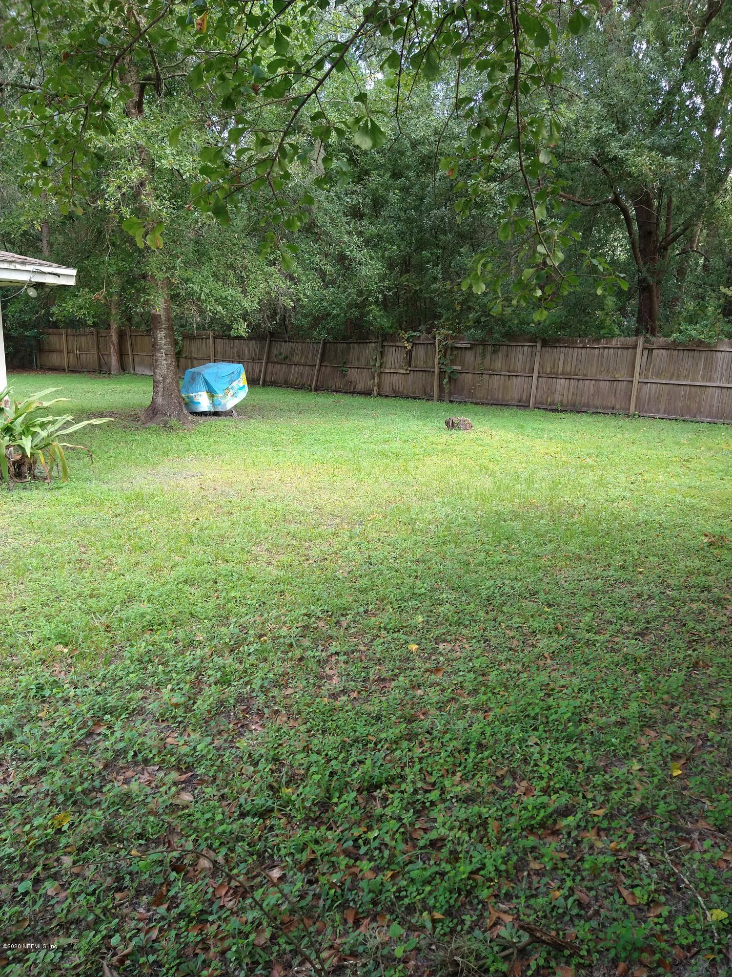 2103 Benedict Road Jacksonville, FL 32209 - Photo 27 of 35 a view of a backyard with a trees