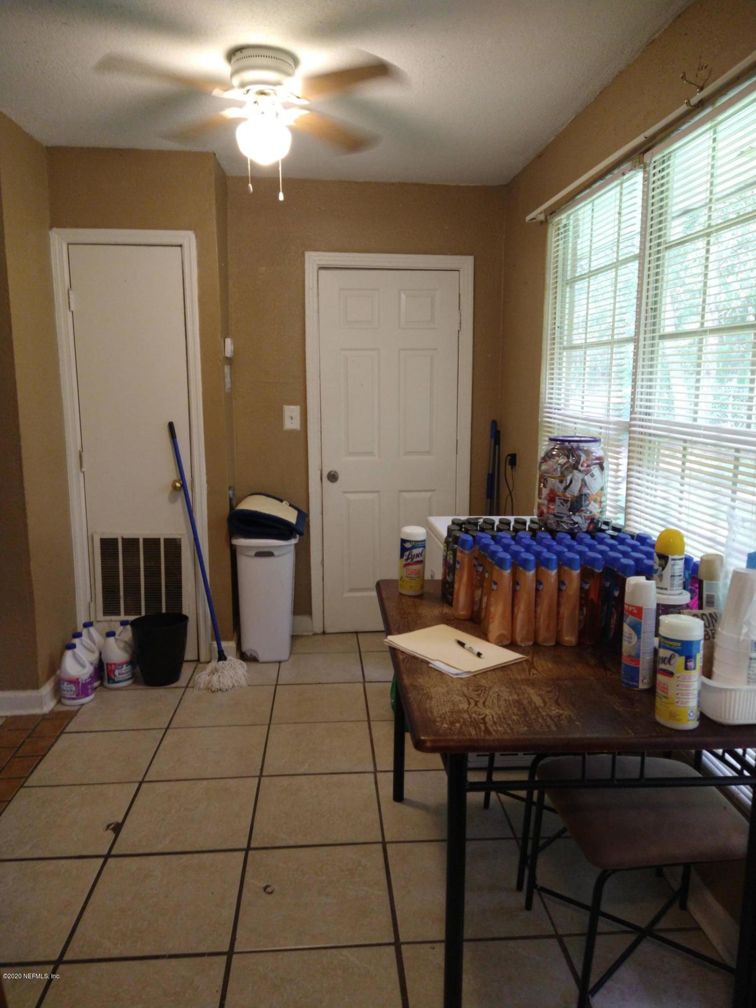 2103 Benedict Road Jacksonville, FL 32209 - Photo 5 of 35 a living room with furniture and a potted plant