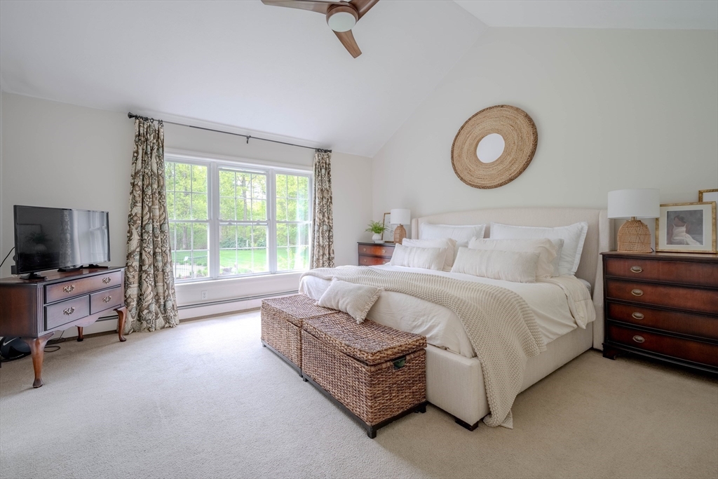 18 Dominitis Drive Holden, MA 01522 - Photo 13 of 41 a spacious bedroom with a bed and a television