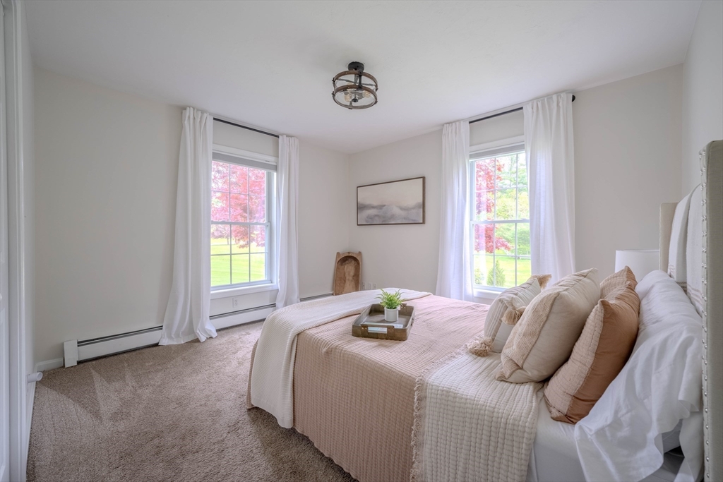 18 Dominitis Drive Holden, MA 01522 - Photo 18 of 41 a bedroom with a bed and a window