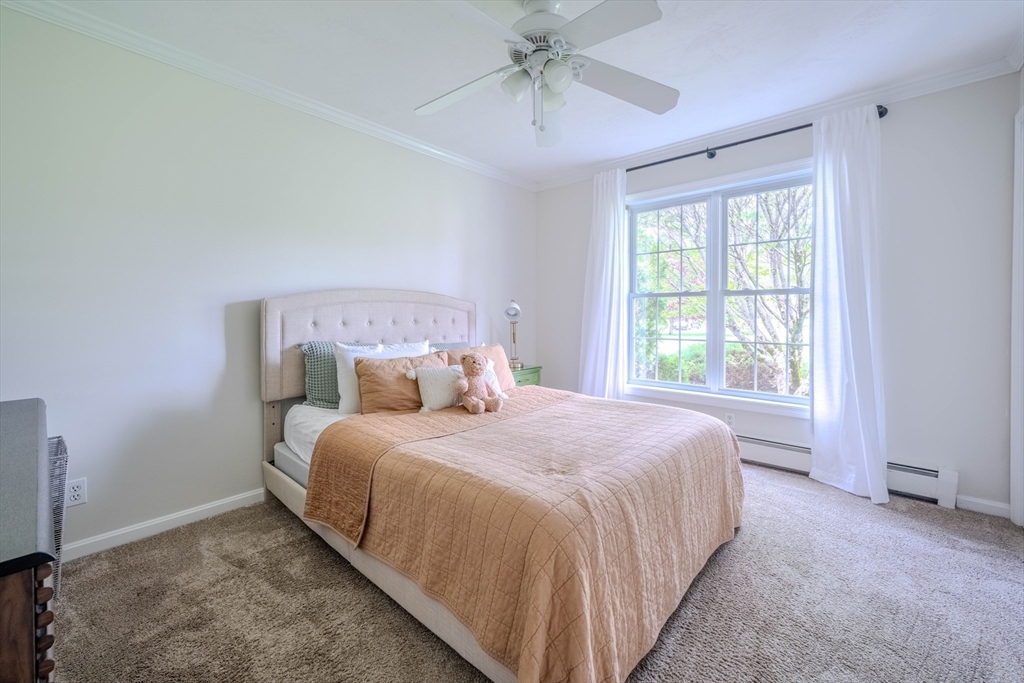 18 Dominitis Drive Holden, MA 01522 - Photo 20 of 41 a bedroom with a bed and window