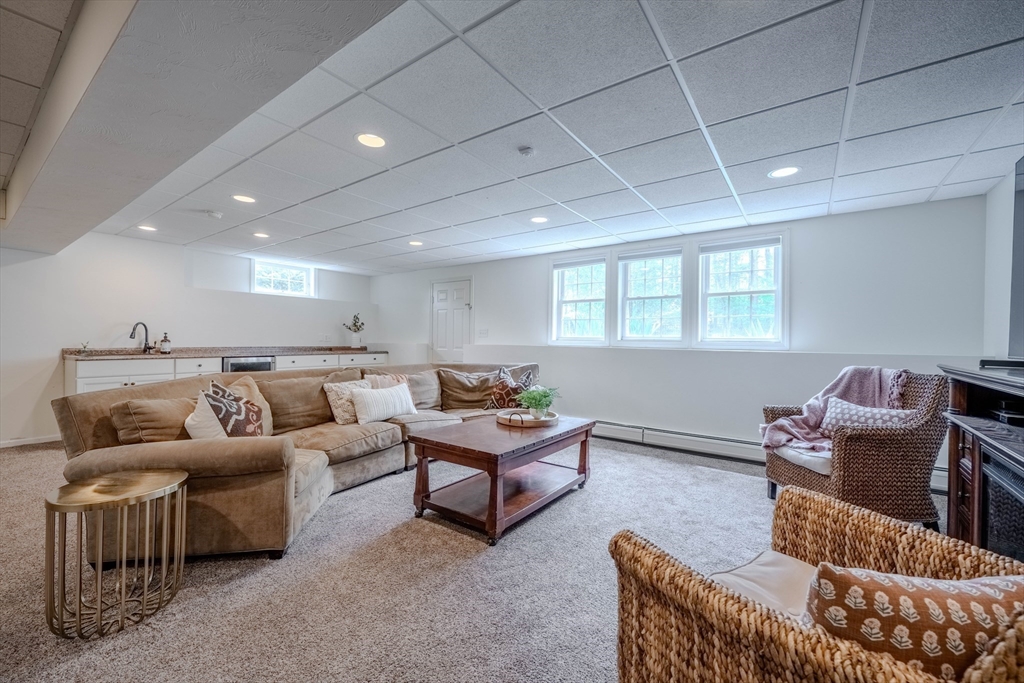 18 Dominitis Drive Holden, MA 01522 - Photo 24 of 41 a living room with furniture and a window
