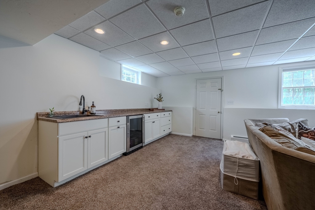 18 Dominitis Drive Holden, MA 01522 - Photo 28 of 41 a kitchen with a sink stove and cabinets