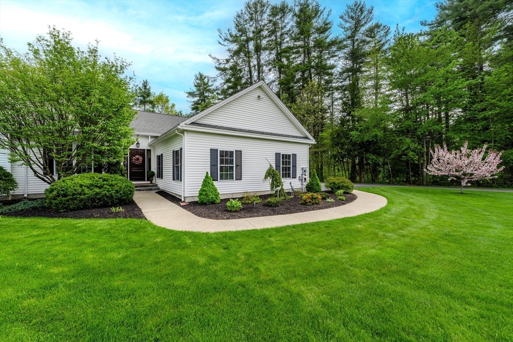 18 Dominitis Drive Holden, MA 01522 - Photo 35 of 41 a view of house with a yard and potted plants