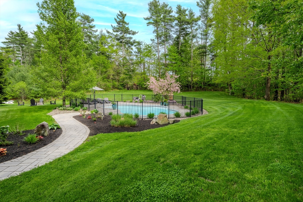 18 Dominitis Drive Holden, MA 01522 - Photo 39 of 41 a view of a garden with trees
