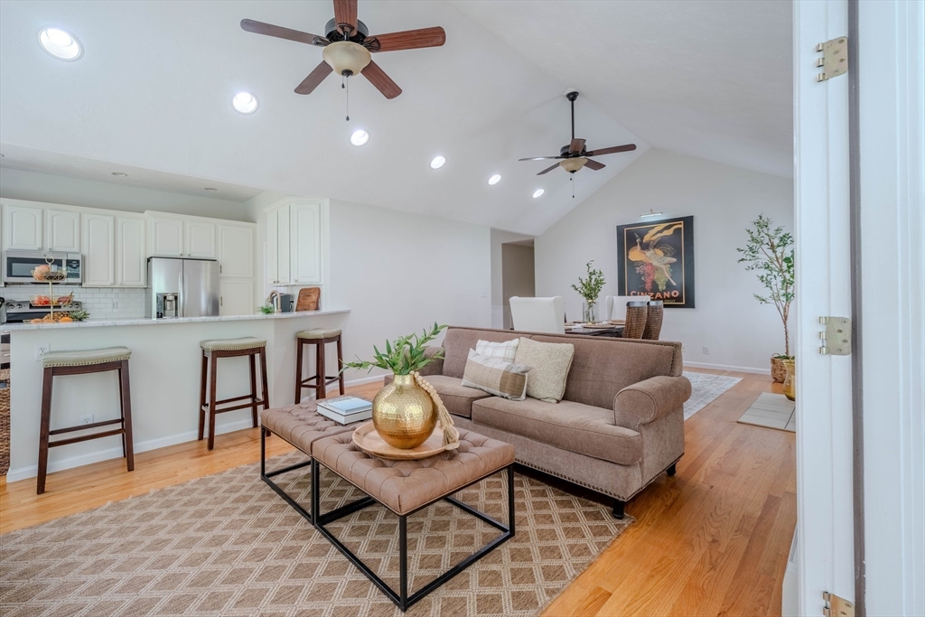 18 Dominitis Drive Holden, MA 01522 - Photo 7 of 41 a living room with furniture a ceiling fan and a rug