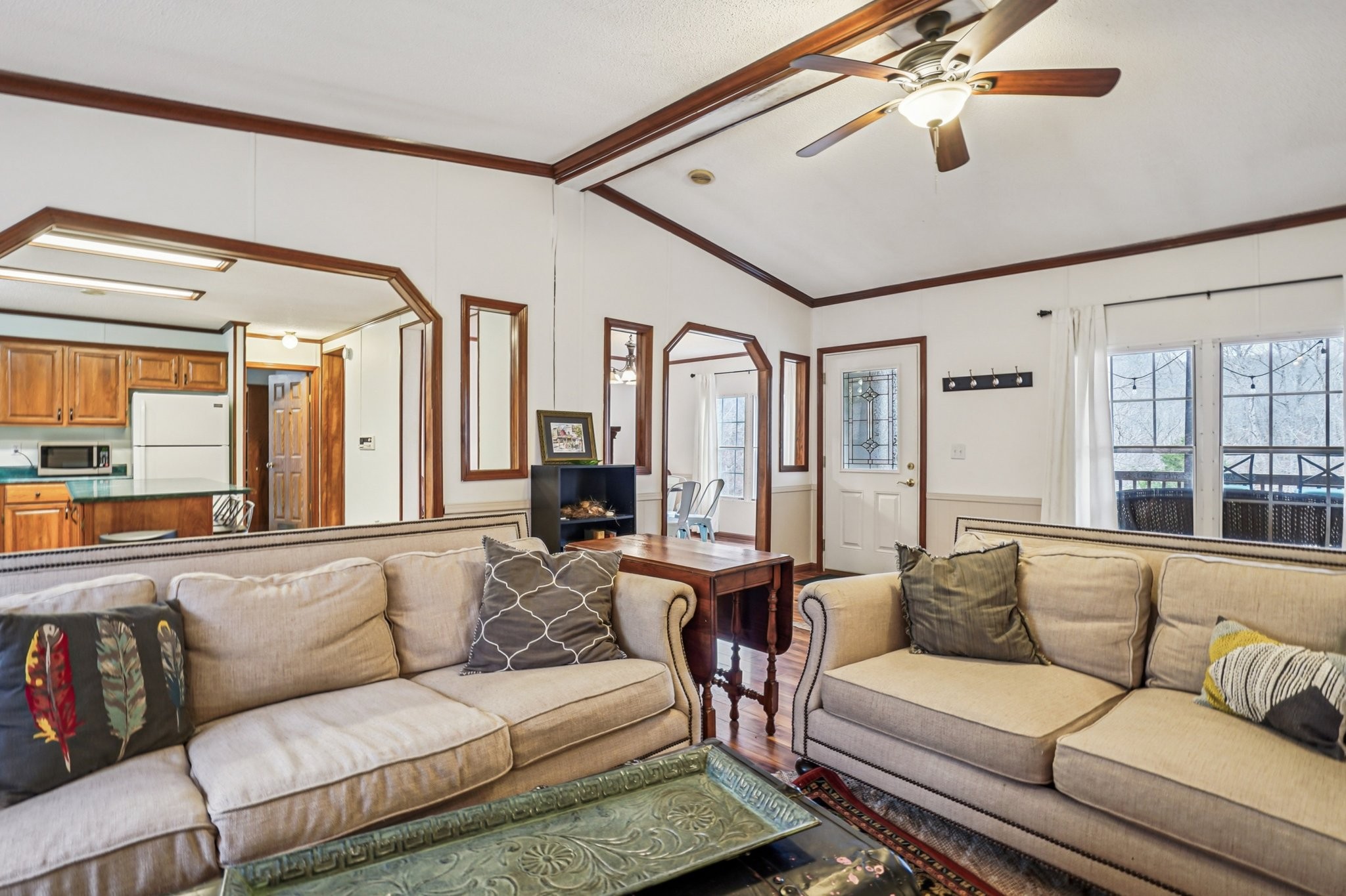 3668 Old Sams Creek Road Pegram, TN 37143 - Photo 12 of 60 a living room with furniture ceiling fan and a rug