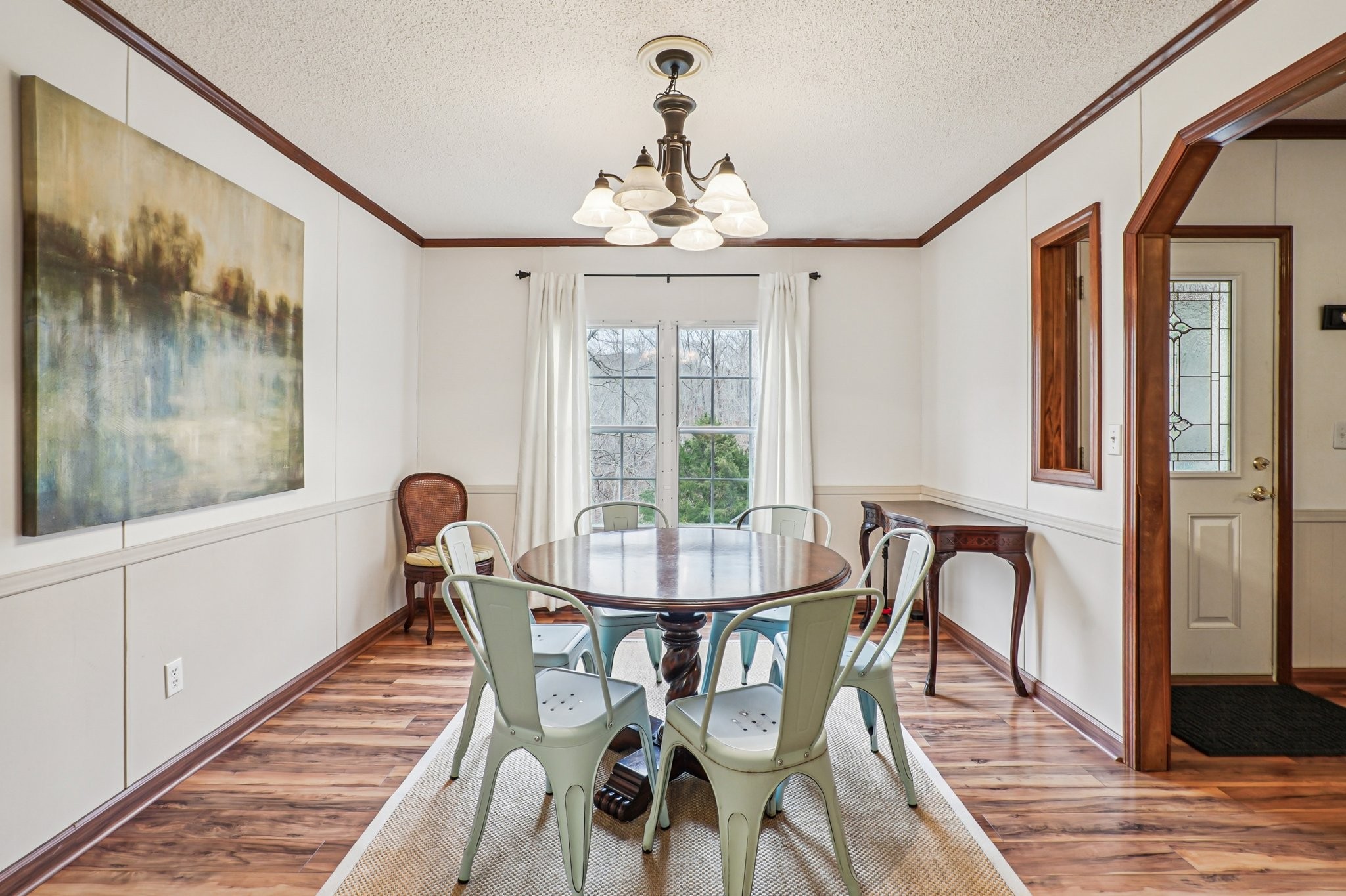 3668 Old Sams Creek Road Pegram, TN 37143 - Photo 13 of 60 a view of a dining room with furniture window and wooden floor