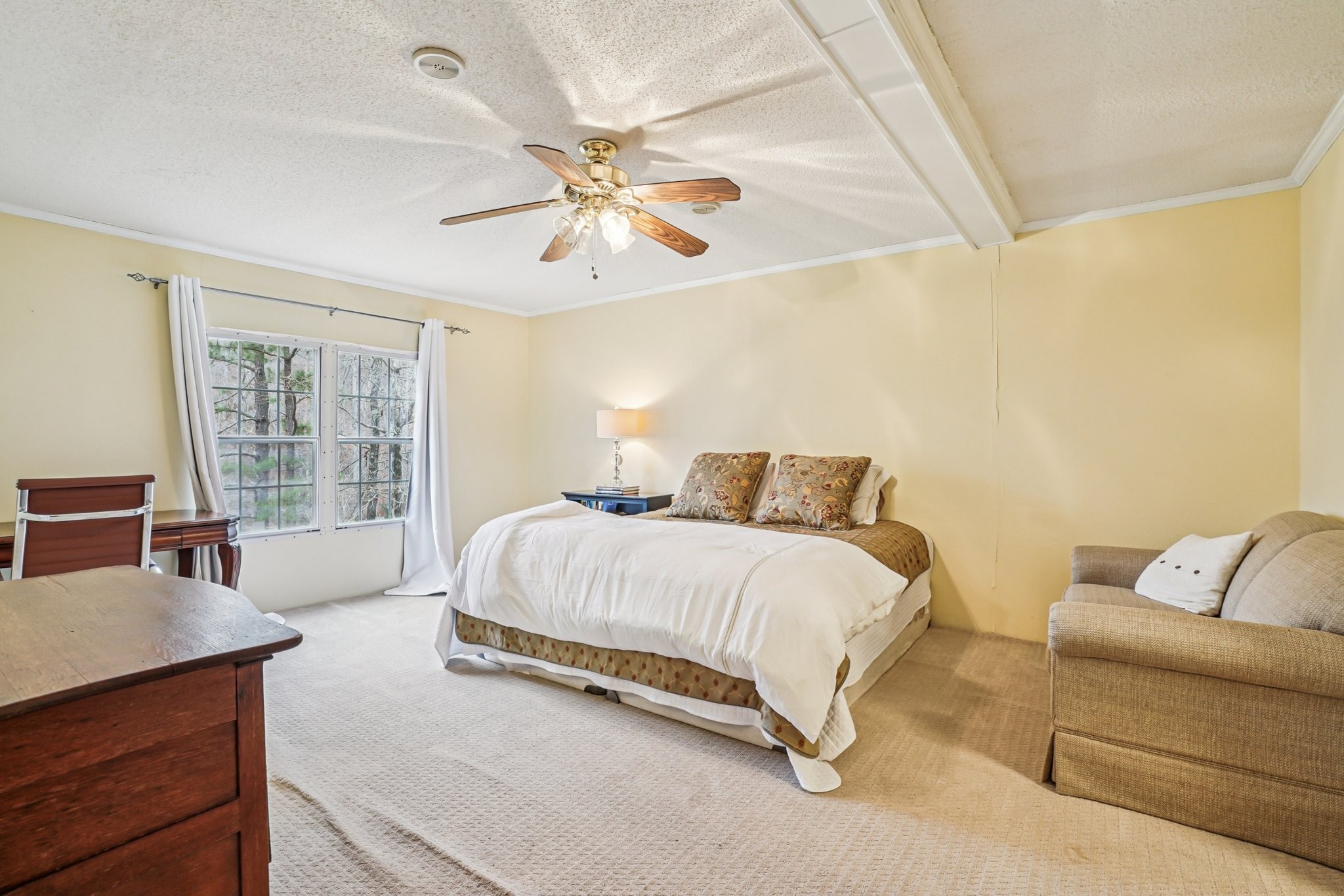 3668 Old Sams Creek Road Pegram, TN 37143 - Photo 25 of 60 a spacious bedroom with a bed and window
