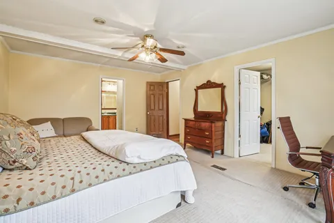 a bathroom with a toilet and a bathtub