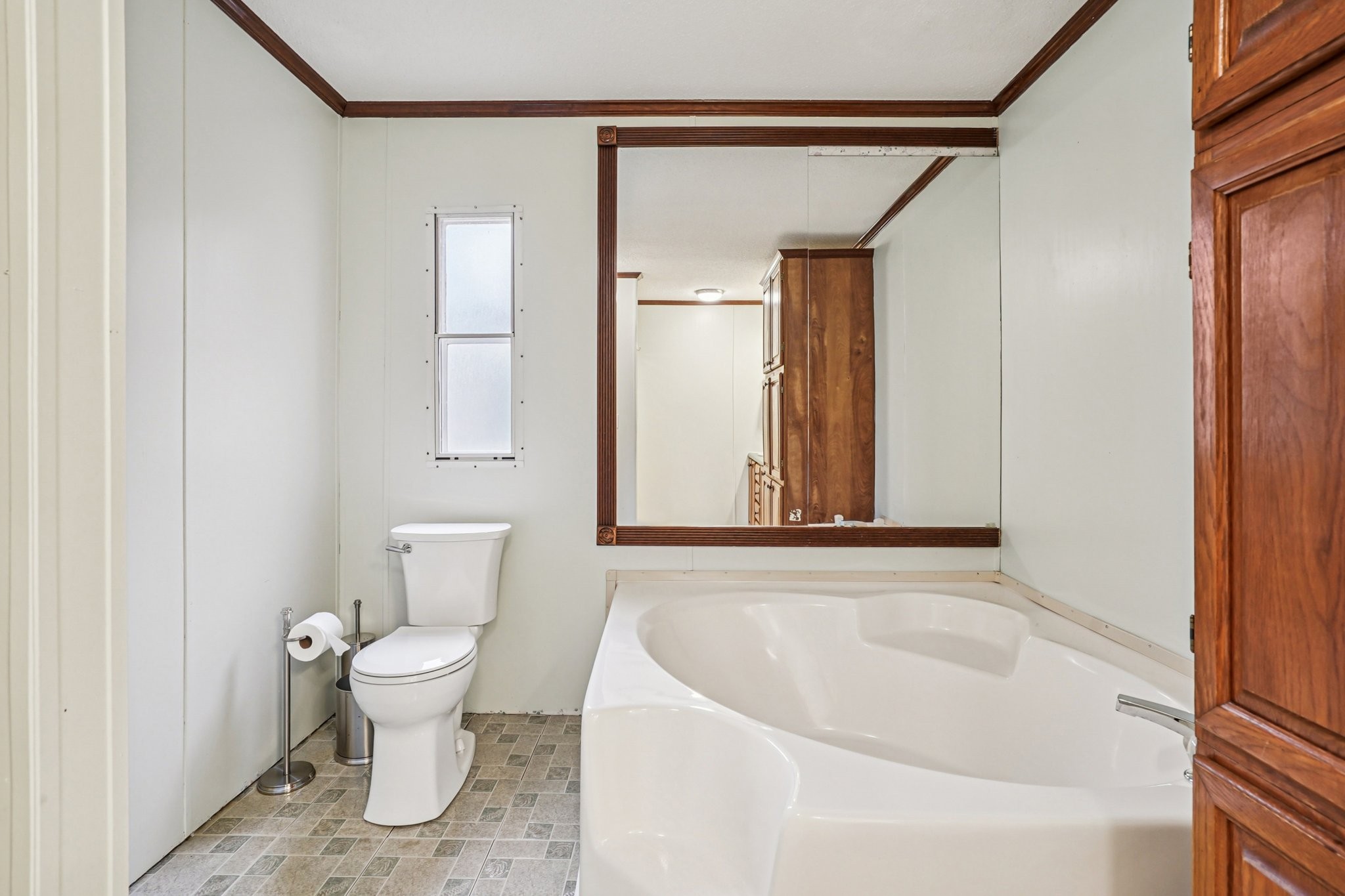 3668 Old Sams Creek Road Pegram, TN 37143 - Photo 30 of 60 a bathroom with a toilet and a bathtub