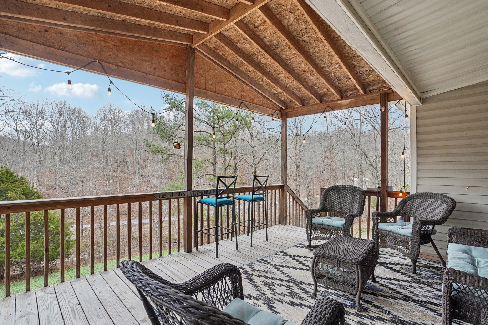 3668 Old Sams Creek Road Pegram, TN 37143 - Photo 33 of 60 a view of a chairs and table in the balcony