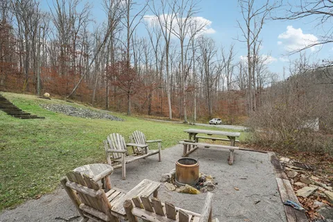 a backyard of a house with trees
